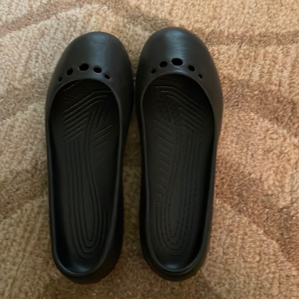 Black Croc slip on flats.